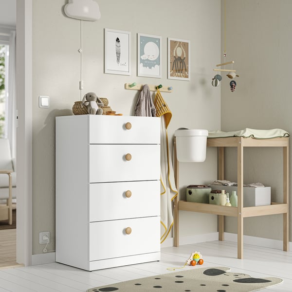 Nursery with LASTARE drawer unit, toys, and wooden changer.