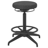 Black circular stool with fabric seat on adjustable metal base with footrest.