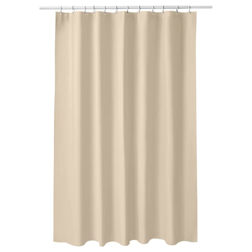Double-sided beige shower curtain on silver rod. Simple, plain, rectangular design. Made from water-repelling eva plastic.
