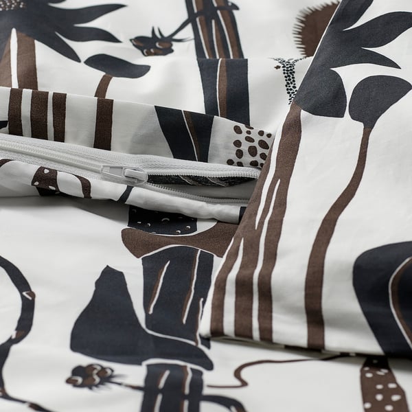 Duvet cover with striped floral design, zip closure visible, made of breathable cotton/lyocell.