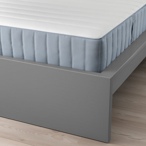 Modern bed frame with high, comfortable headboard. Freestanding or wall-mounted. Adjustable bed sides.