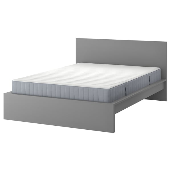 Grey MALM bed with white mattress, minimalist design.