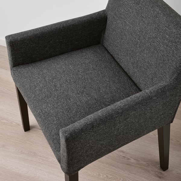 Dark grey upholstered chair with wooden legs; comfortable padding, clean design.