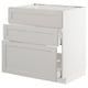 A light grey METOD kitchen cabinet with bevelled drawer fronts, featuring three drawers, smooth drawer runners, and a sturdy frame.