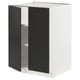 A modern white cabinet with black doors, part of the ikea METOD kitchen system. It a sleek, square design with adjustable shelves.