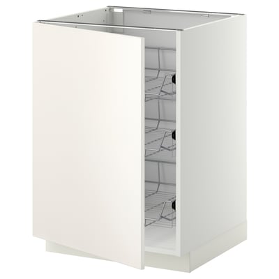 A white METOD base cabinet from IKEAs kitchen system with open wire baskets.
