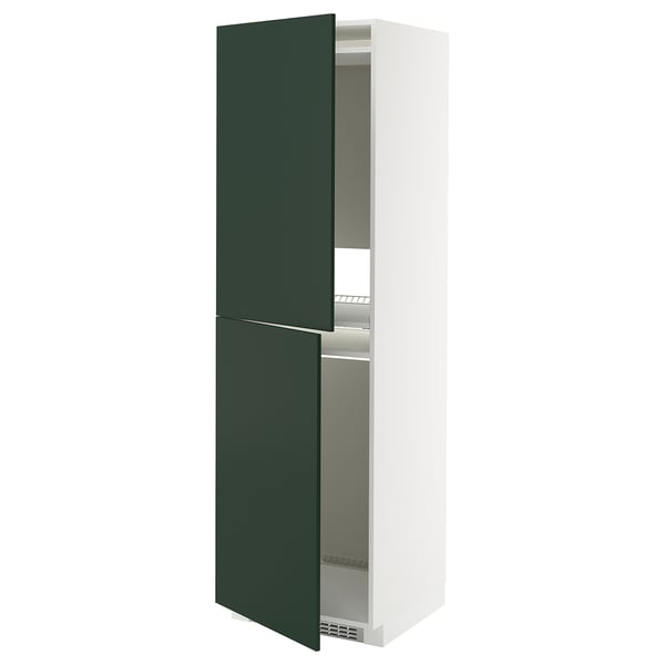 Modern white cabinet with green doors, open revealing shelves.