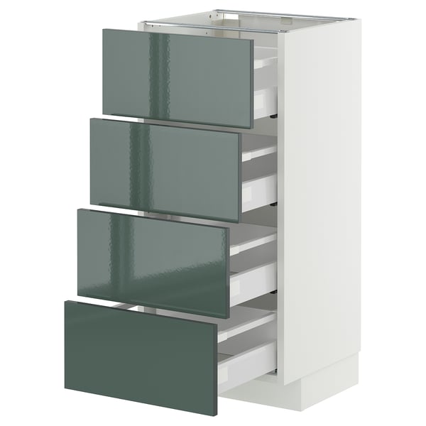 High-gloss grey-green METOD kitchen drawer unit with four open drawers. Modern, vertical design with white frame and metal runners.