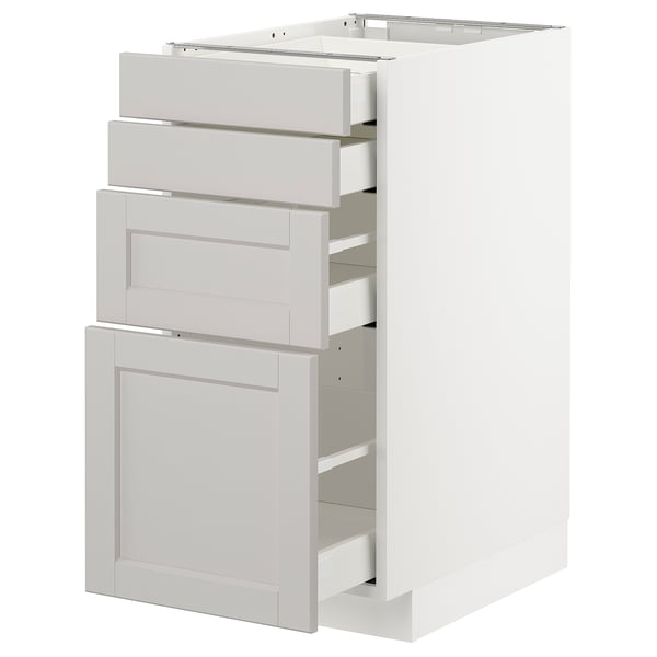 White METOD kitchen cabinet with grey drawers featuring classic, bevelled edges and self-closing drawers.