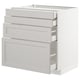 White METOD kitchen cabinet with multiple drawers and sleek, bevelled edges.