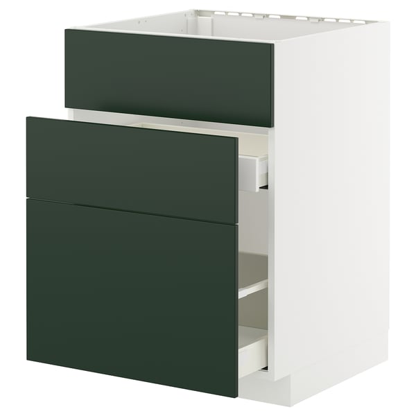 Modern white cabinet with dark green drawers.