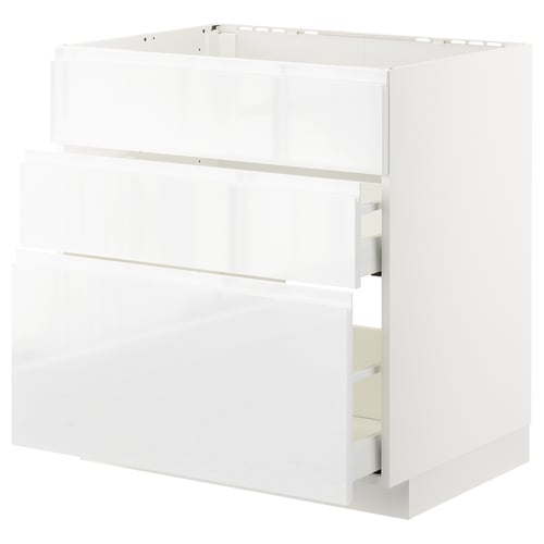 A white METOD kitchen cabinet with smooth drawers and a sleek, modern design.