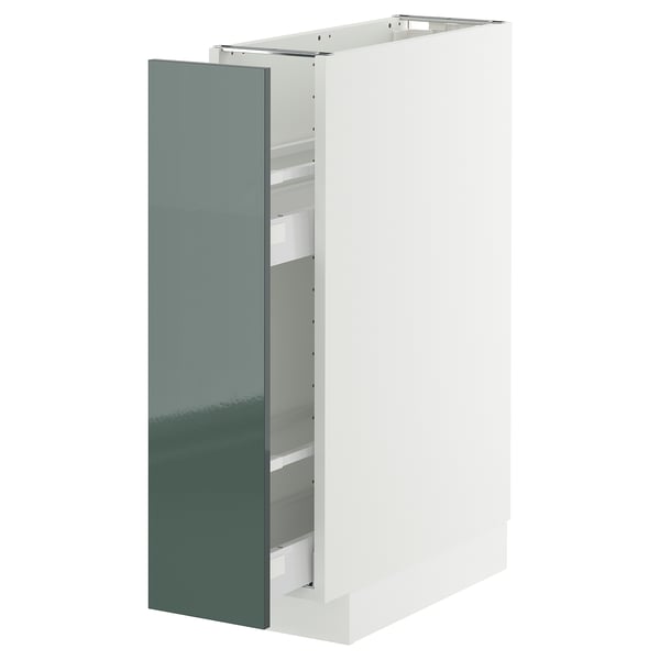 Modern white kitchen cabinet with high-gloss green door, sleek handleless design, partial pull-out drawer seen.