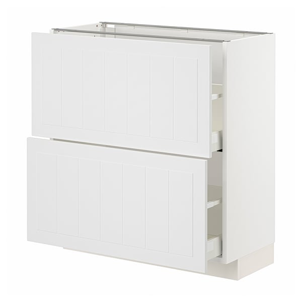 White METOD kitchen unit. Two cabinets with vertically grooved fronts and two drawers.