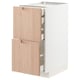 METOD kitchen unit with light bamboo drawers, modern design.