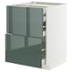 Modern METOD kitchen cabinet with glossy grey-green drawers.