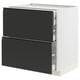 METOD kitchen unit in matte black, sleek drawers with integrated handles.