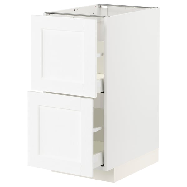 White kitchen cabinet with two drawers and shelves, modern design.