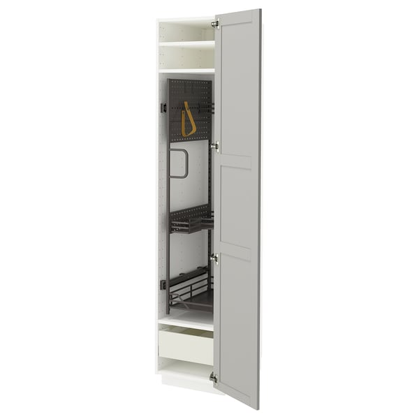 An open white METOD kitchen cabinet with adjustable shelves and a drawer. It a modern design with beveled edges.