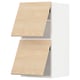 Two light wooden kitchen cabinets with open doors, featuring light ash finish and silver handles.