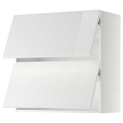 White modern kitchen cabinet with sleek, high-gloss finish and angular design.