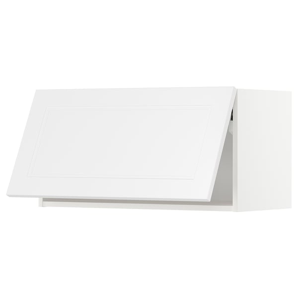 White METOD kitchen cabinet with angled design, sleek modern look.