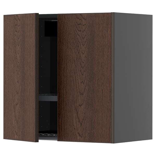 Dark brown kitchen wall cabinet with wood grain finish and open door.