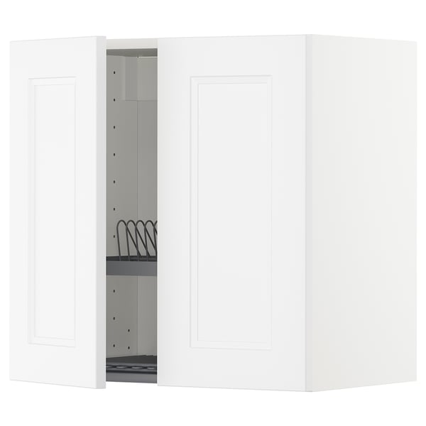 A white METOD kitchen wall cabinet with one open door, revealing adjustable shelves and a black dish drainer inside.