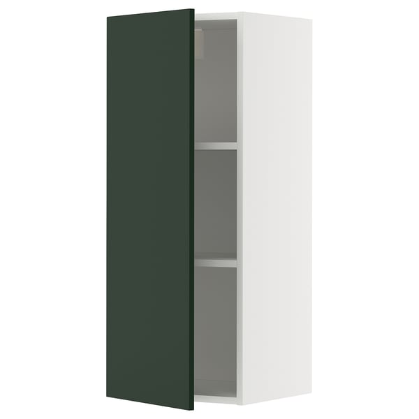 Modern METOD kitchen unit with 2 shelves, one door open, green color, white frame, square shape.