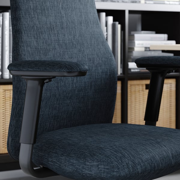Office chair labelled MITTZON, dark grey, mesh back, armrests.