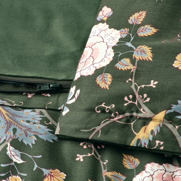 Floral green duvet with zippers, showcasing sateen weave and soft fabric.