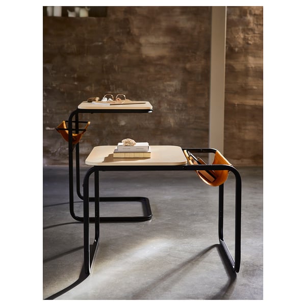 OLSERÖD dual table setup, black & beige, sleek design. Compact yet spacious, ideal for multi-use spaces.