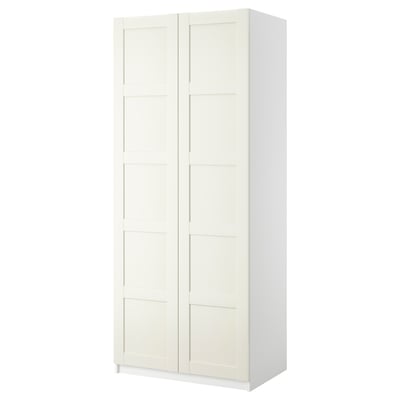 A white PAX wardrobe with two hinged doors, featuring a sleek, minimalist design.