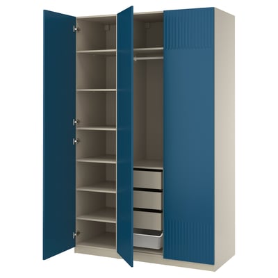 Open blue PAX wardrobe with shelves and drawers.