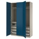 The open ikea PAX wardrobe with blue doors, featuring shelves and drawers inside.