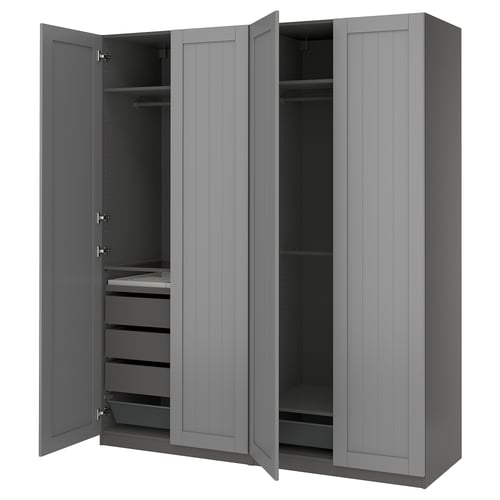 A grey IKEA PAX wardrobe with open doors, revealing shelves and drawers.