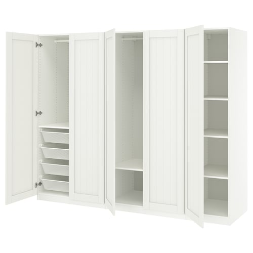 White PAX wardrobe with mesh baskets, adjustable shelves, and soft-closing doors.