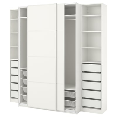 White PAX wardrobe with multiple shelves and drawers, sliding doors, steel and particleboard construction.