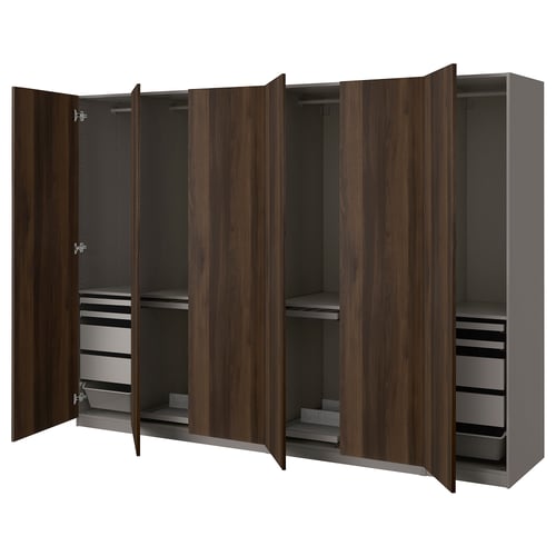 A PAX wardrobe with wooden doors in an espresso finish. It has a modern design with multiple compartments for organised storage.