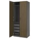 A PAX wardrobe, a classic closet with wooden doors and multiple drawers. Its designed for organizing clothes efficiently.