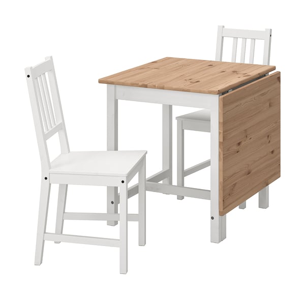IKEA PINNTORP white wooden table set includes a square drop-leaf table and two high-back chairs with slatted seats.