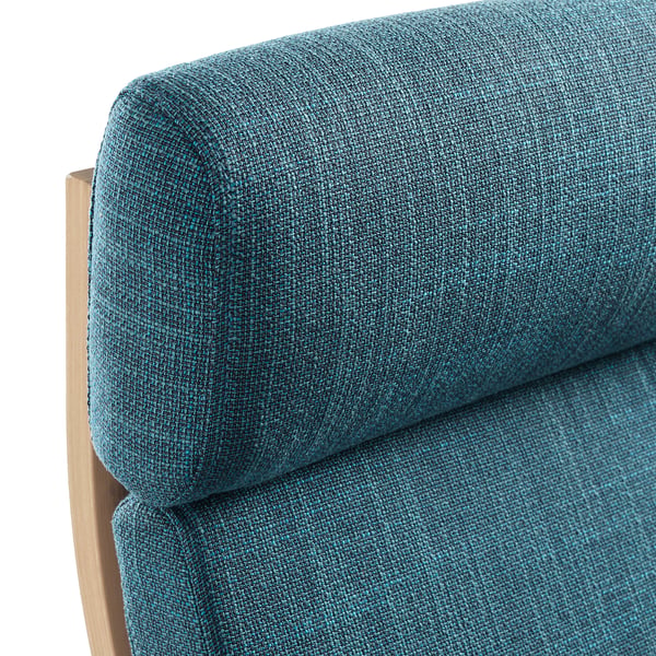 Best poang chair close-up: plush teal fabric, sturdy wood frame, elegant curve.