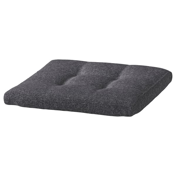 Dark grey POÄNG cushioned footstool with tufted design, recycled fabric.