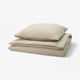SCHERSMIN beige duvet set. Soft, organic cotton with wavy texture. Includes comforter and pillowcases.