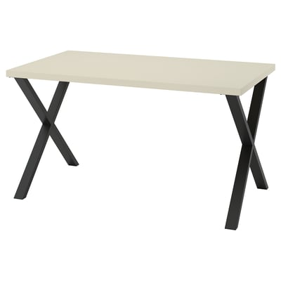 SKÅLSTA table, light beige top, black legs, rectangular shape, minimalist design.