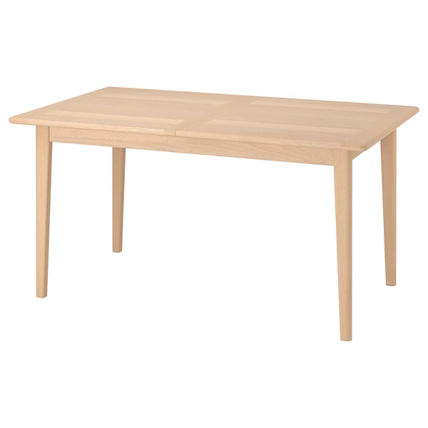 SKANSNÄS beige dining table: rectangular, tapered legs, minimalist scandinavian design.