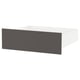 A SKATVAL drawer in black and white, with a rectangular shape and simple design.