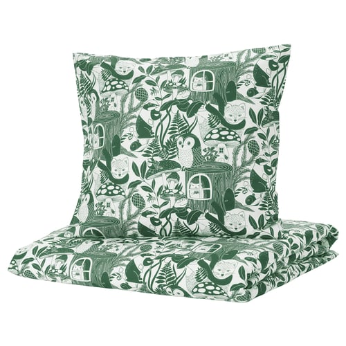 Forest-themed green and white duvet with woodland creatures and treehouses.