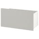 White boxy storage unit with angled top and smooth finish.