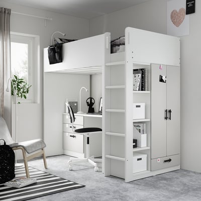 Modern white kids loft bed setup with desk, storage, and stairs. Bright, organised room with minimalist decor.